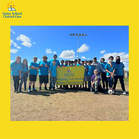 Otondo Elementary 5th grade soccer team group photo holding championship banner