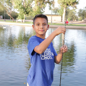 Student with fishing rod